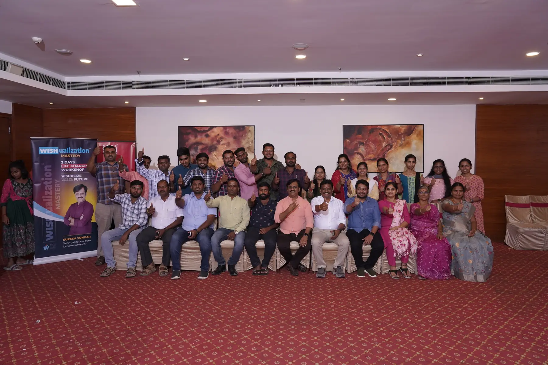 A full batch of participants seated for the group photo
