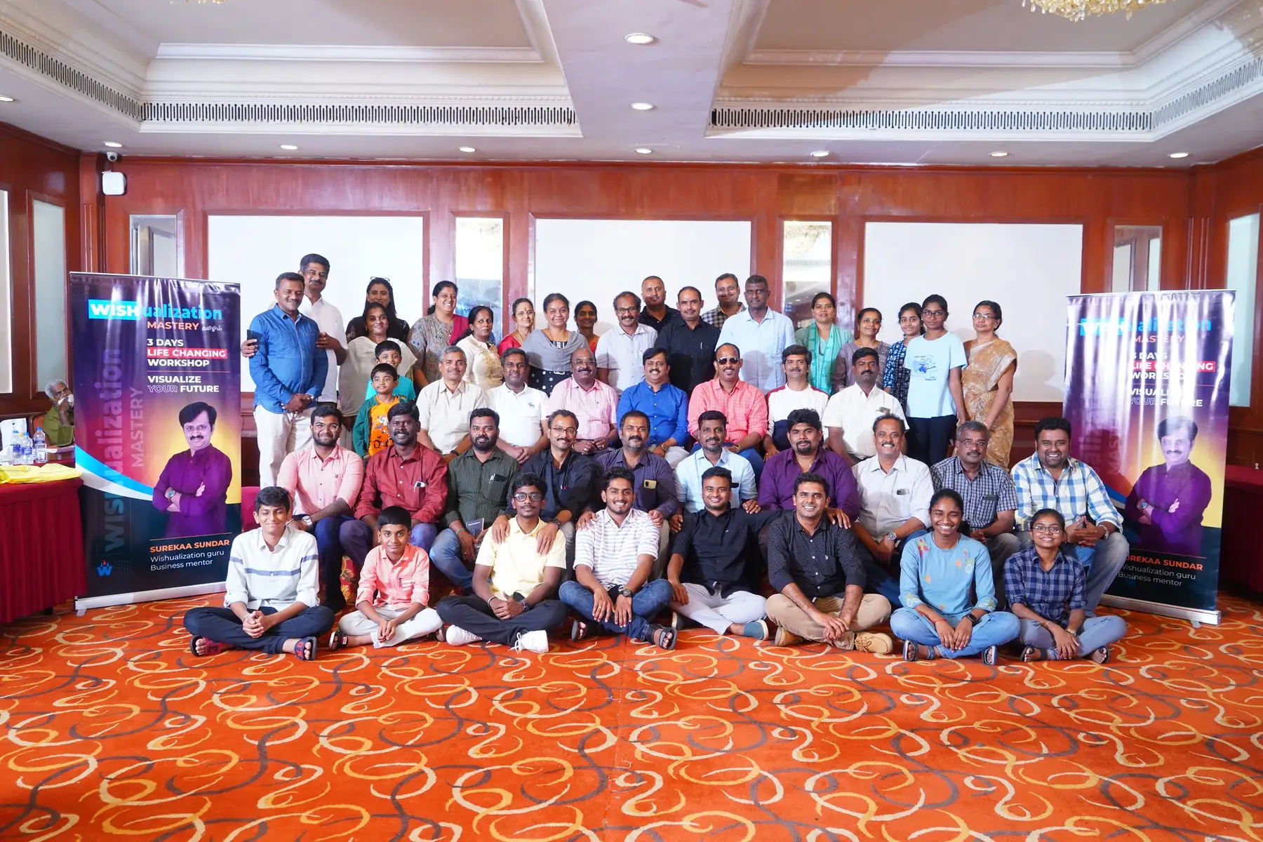 A full batch of participants seated together for the group photo