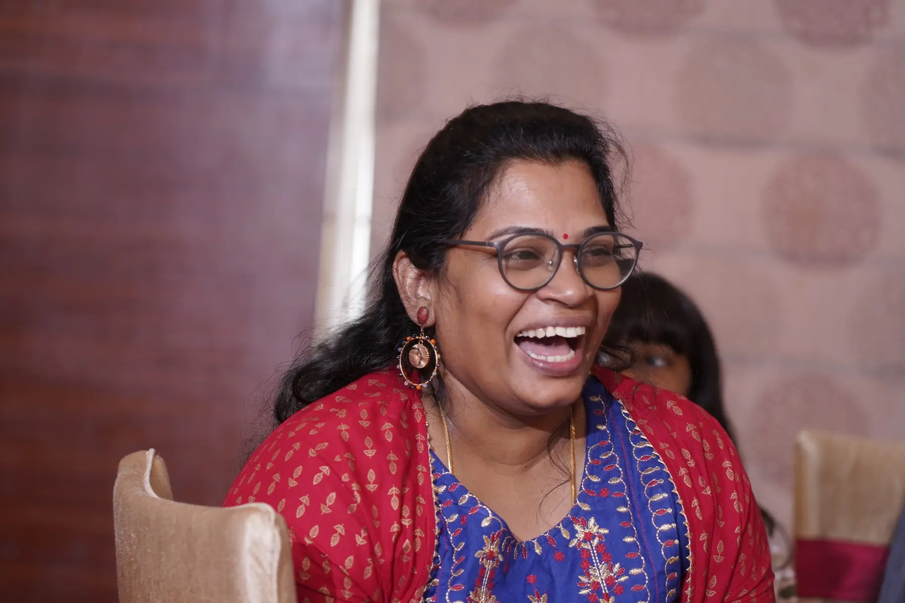 A participant laughing with joy