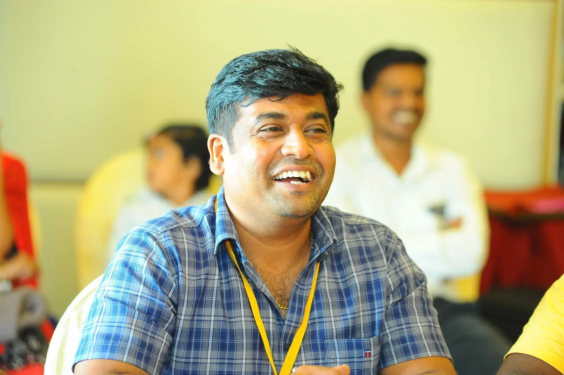 A participant laughing out loud