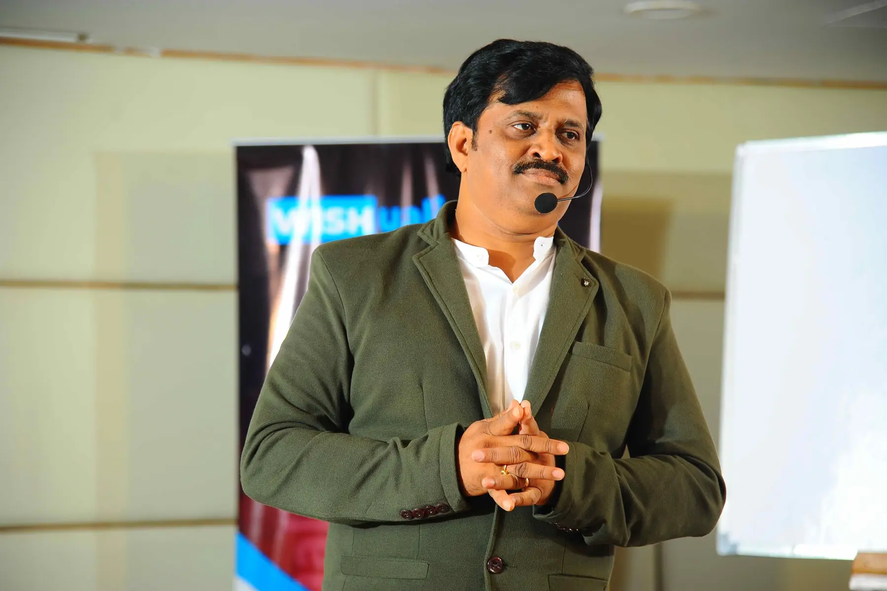 Surekaa Sundar smiling in a blazer