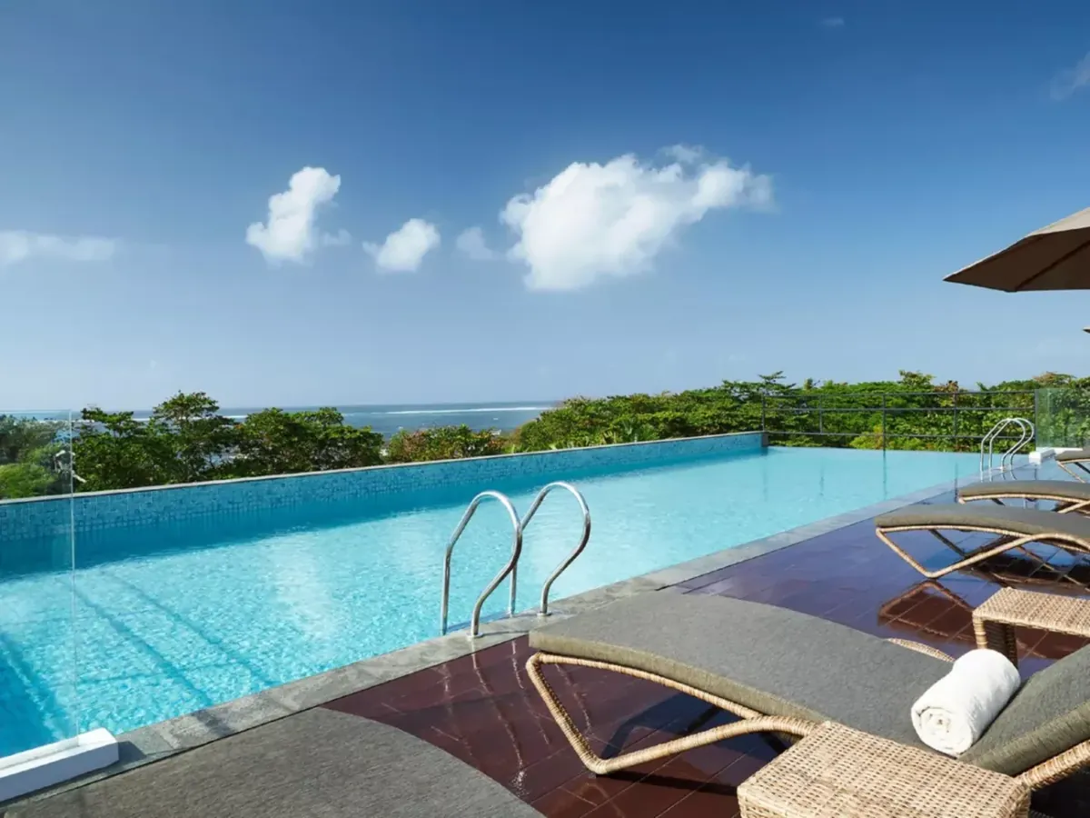 The rooftop pool at Holiday Inn Bali Sanur, looking out to the sea